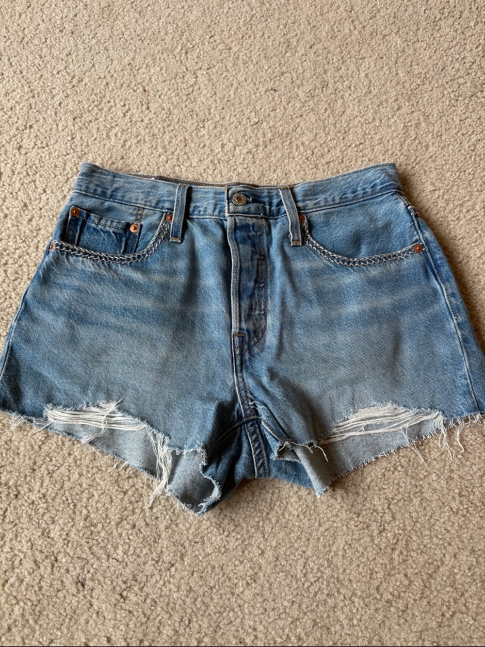 Levi's Light Blue High-Rise Denim Cutoff Shorts, size 28.